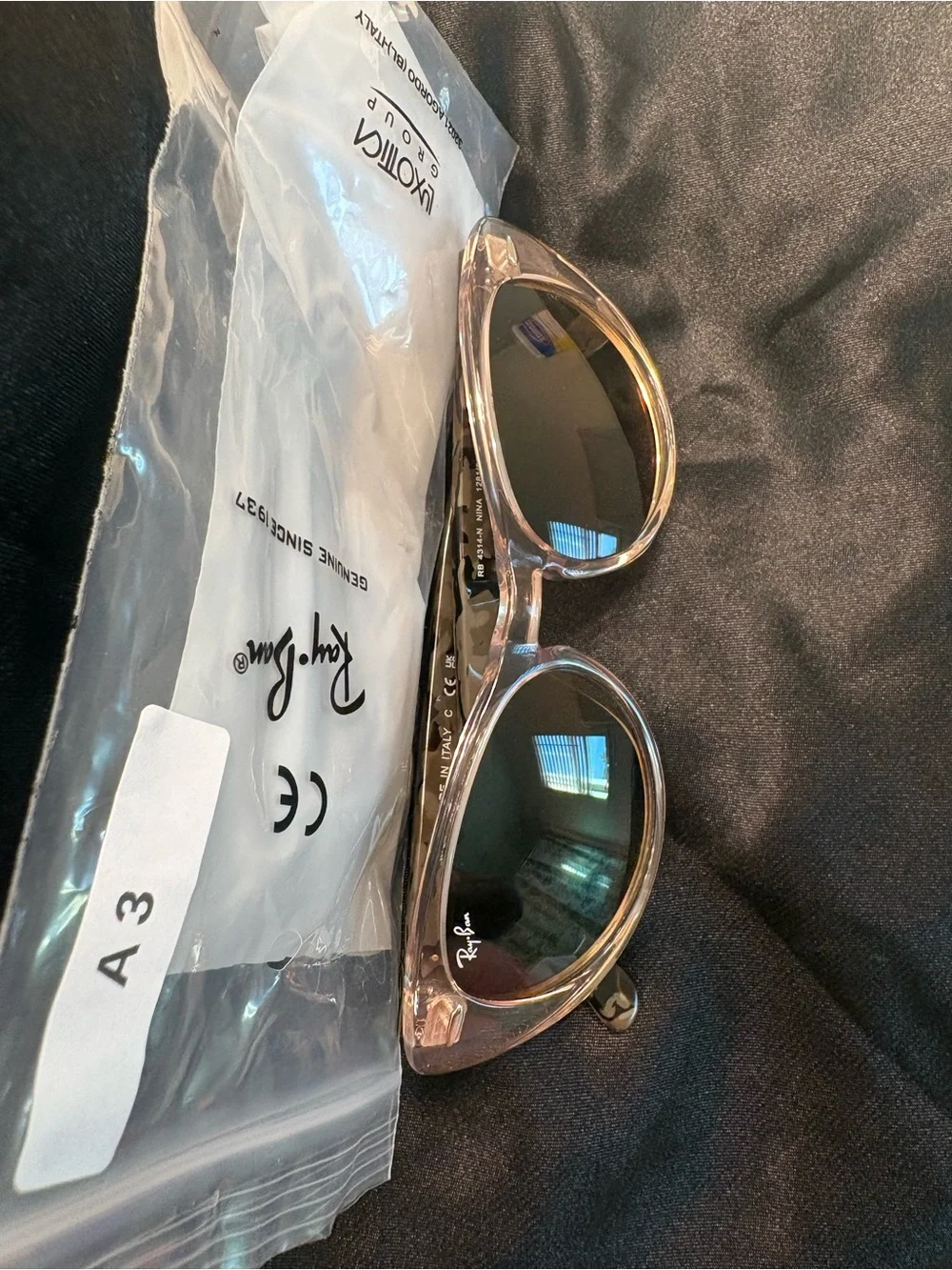 Ray-Ban Ninas Sunglasses in clear frame with green tortoise